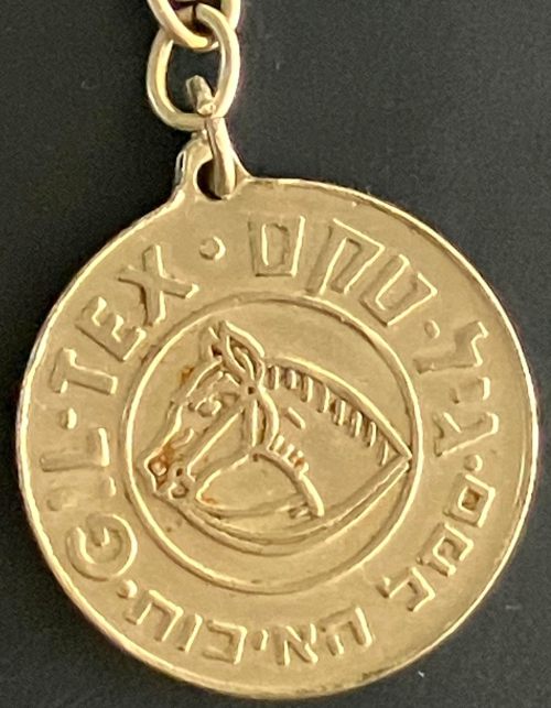Gil-Tex medal with Uzi