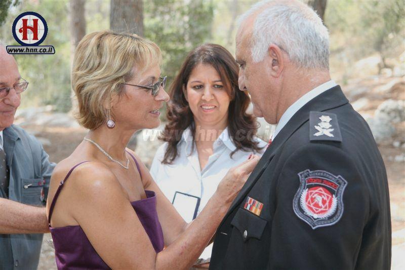 Shimon Romach gets medal put on