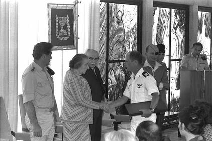 Captain Ayalon is handed the decoration of Valor