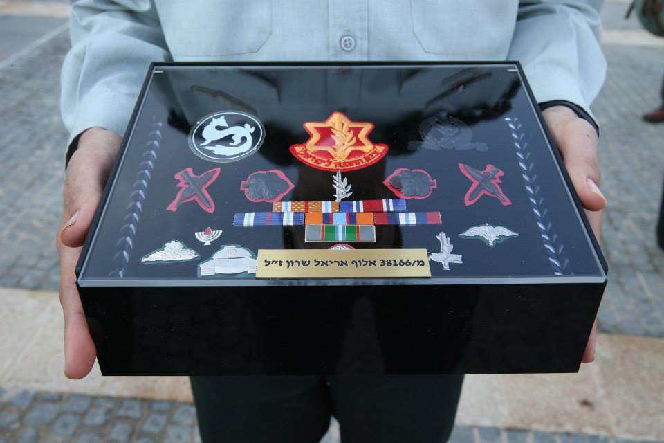 Medals displayed at funeral of Ariel Sharon