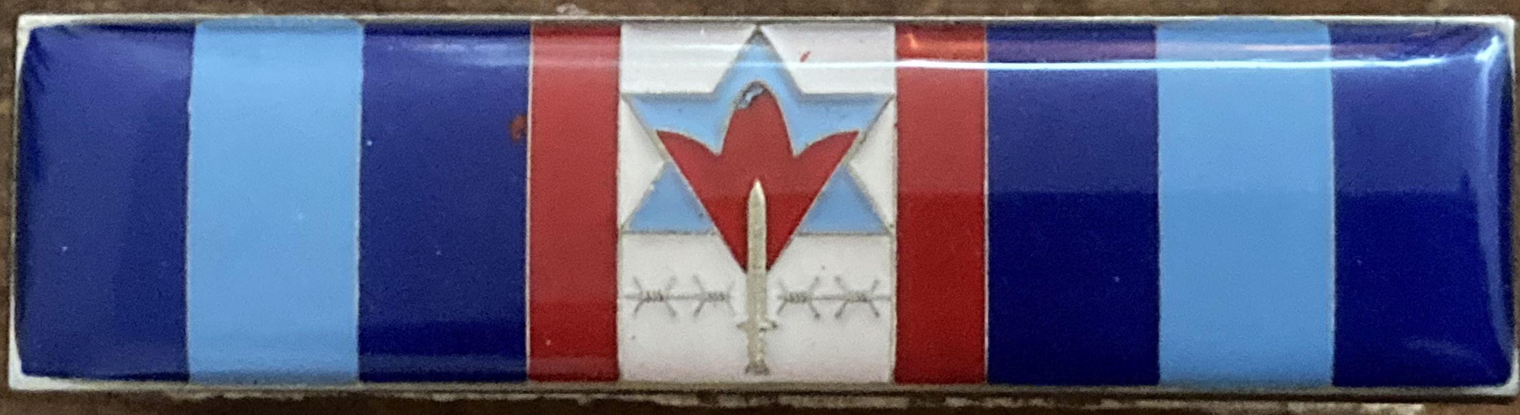 Prisoners of War badge front